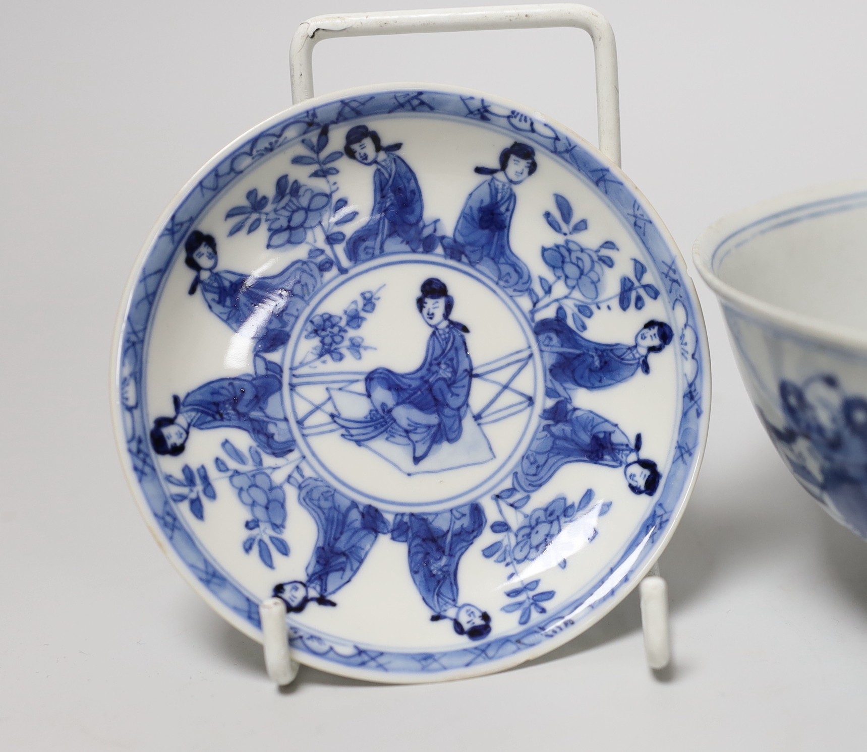 A Chinese Kangxi blue and white tea bowl and saucer, and a blue and white bowl, largest 13cm diameter